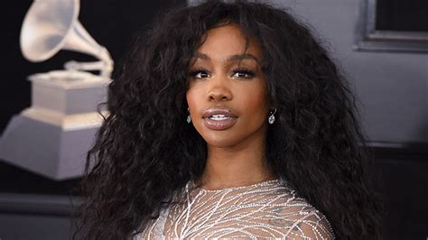 does sza write her own music about love and heartbreak?